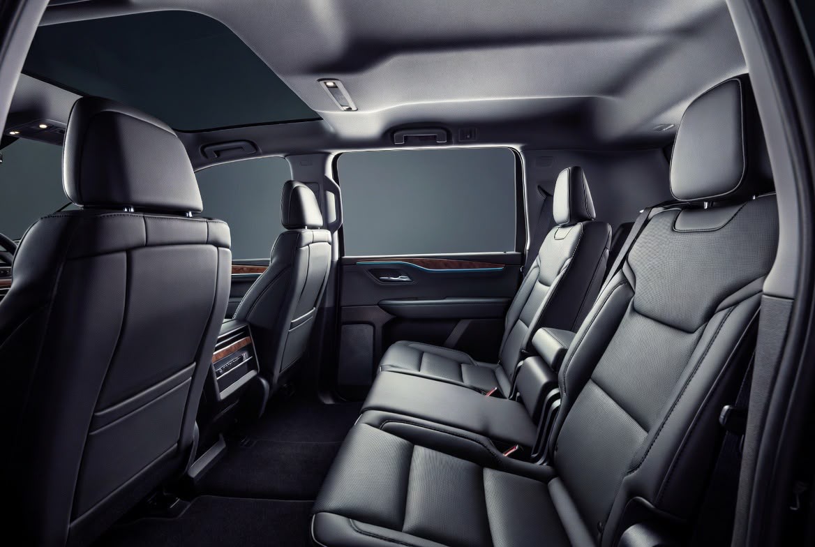 Luxury SUV rear cabin wood trim ambient lighting